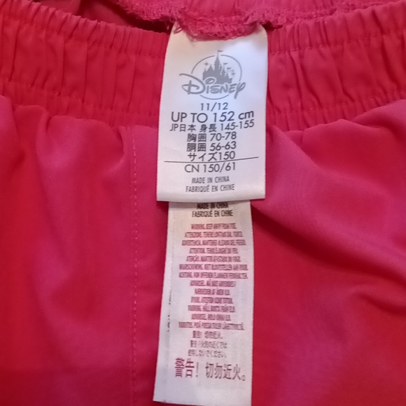 Disney - Girls Pink Minnie Mouse Swim Shorts. Size 11/12. - Picture 4 of 6